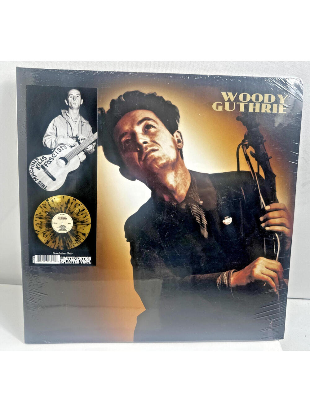 Woody Guthrie - This Machine Kills Fascist (Gold-Black Splatter Vinyl)